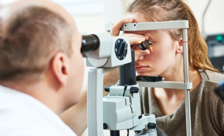 Comprehensive eye exam on young woman
