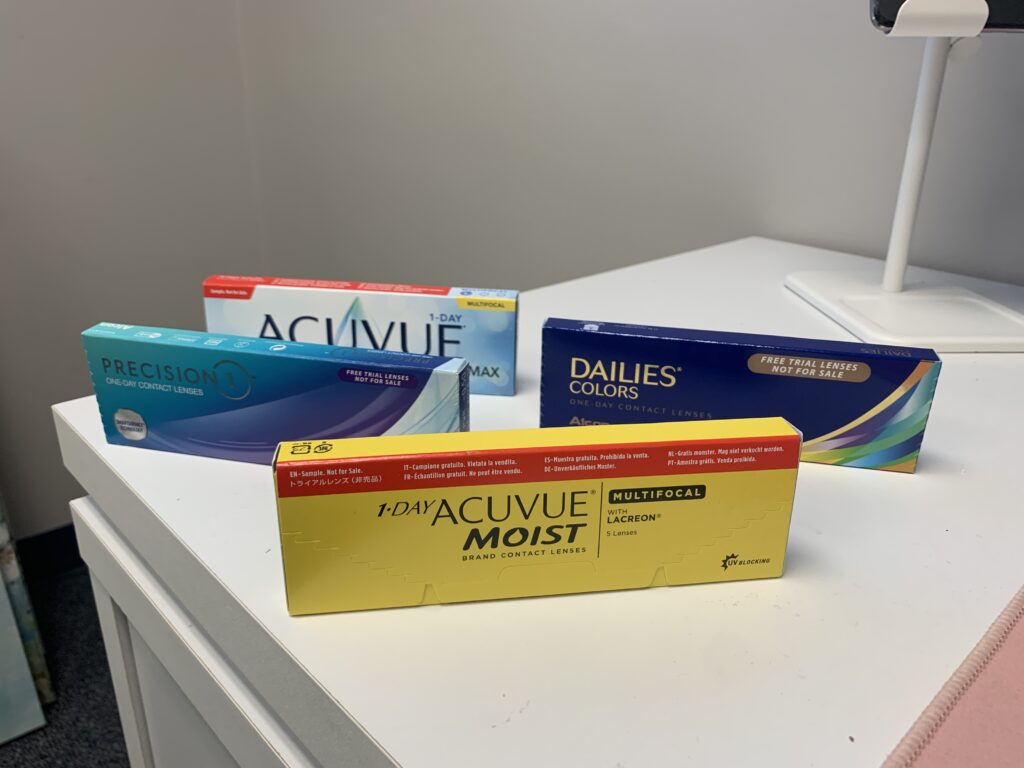 A selection of different contact lens boxes available after a contact lens exam in Detroit.