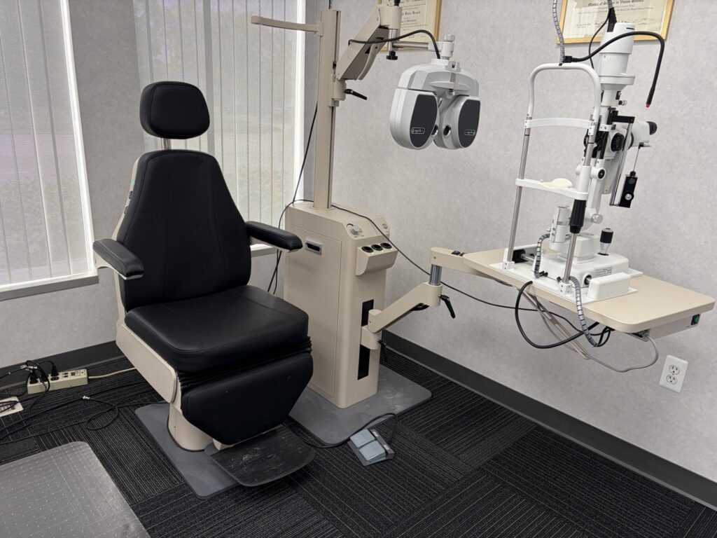 Comprehensive eye exam lane with phoropter and slit lamp at Michigan Contact Lens in Southfield, MI
