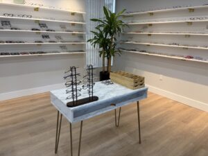 Eyeglass frame selection table at Michigan Contact Lens in Southfield, MI